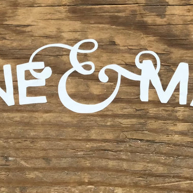 Script. Sticker. White